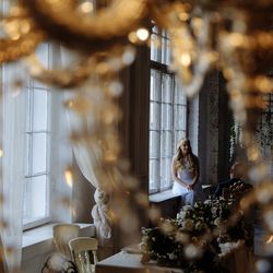 Blurred motion of woman hanging on table