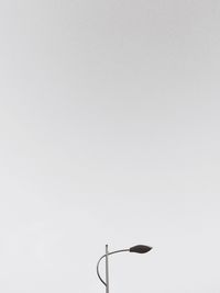 Low angle view of street light against clear sky