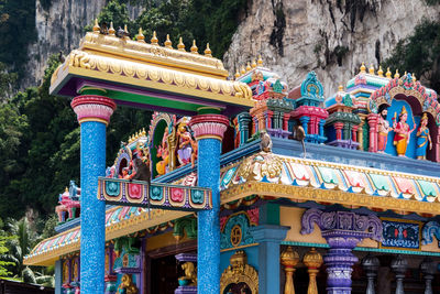 Low angle view of temple against building