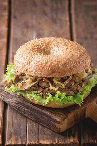 Close-up of burger on wooden tray