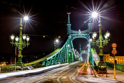 Light trails on bridge at night