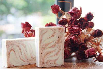 Close-up of roses on table