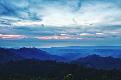 Scenic view of mountains against sky during sunset