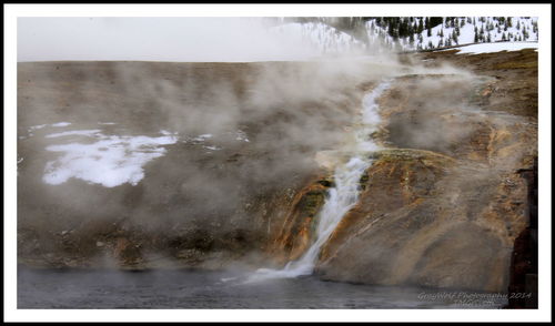 View of waterfall against sky