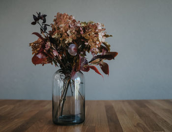 Close-up of flowers in vase on table