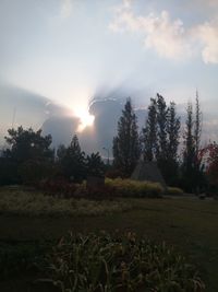 Scenic view of field against sky during sunset