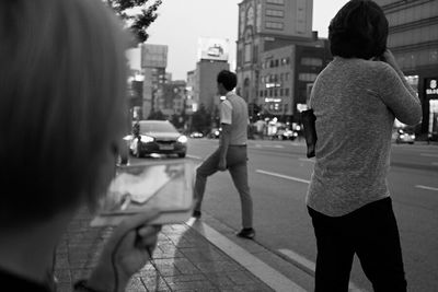 Woman standing in city