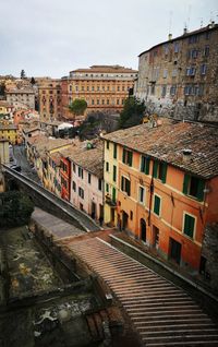 Buildings in city against sky