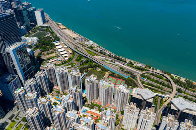 Aerial view of cityscape by sea