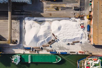 Aerial view of a quarry along tagus river in industrial area of lisbon, portugal.