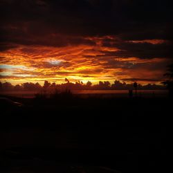 Scenic view of silhouette landscape against sky during sunset