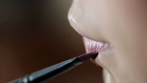 Close-up of woman wearing mask