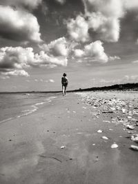 Woman standing on beach