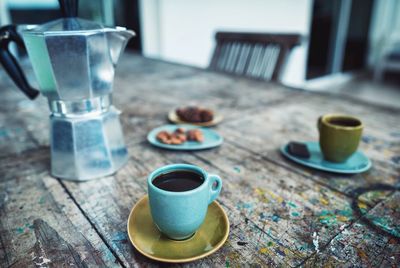 Close-up of coffee cup on table