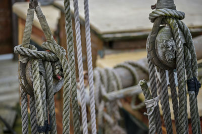 Close-up of rope tied on wooden post