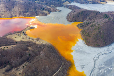 Aerial view of copper waste in lake amidst mountains