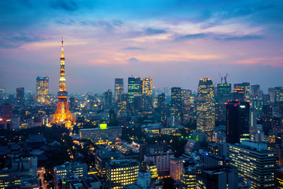 High angle view of illuminated buildings in city against sky
