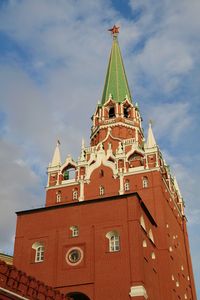 Low angle view of clock tower against sky