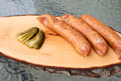 High angle view of meat on cutting board