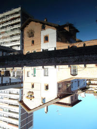 Houses against clear blue sky