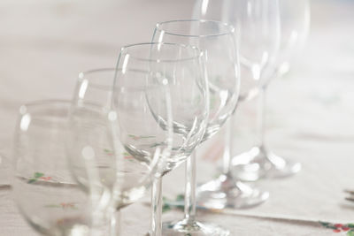 Row of empty wineglasses on table