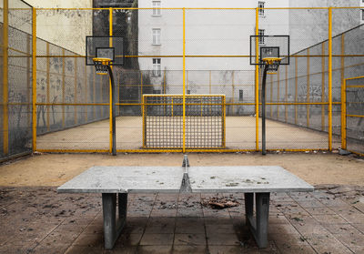 View of an abandoned shopping cart against wall