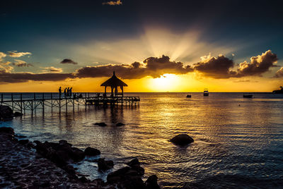 Dramatic sky over sea during sunset