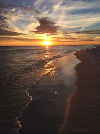 Scenic view of sea against dramatic sky