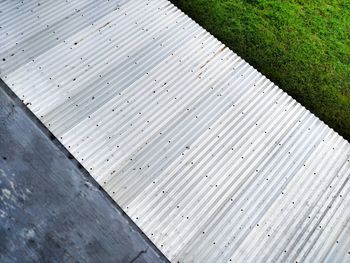 High angle view of footpath by building