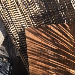 High angle view of metallic structure on building during sunny day
