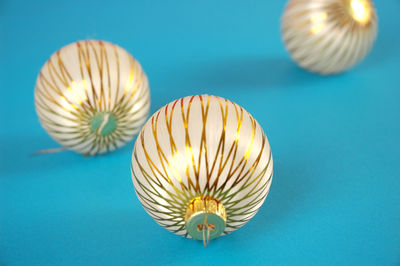 Close-up of seashell on blue background