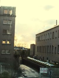 Buildings in city against sky