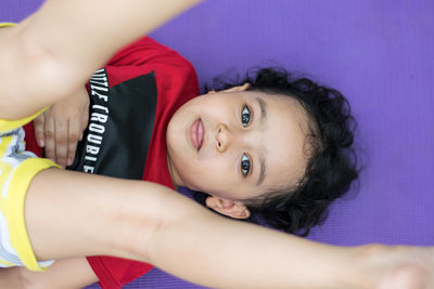 Portrait of cute girl lying down