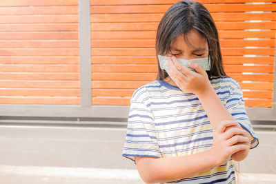 Stay at home, coronavirus, sick asian girl of corona virus wearing mask, self-quarantine concept.