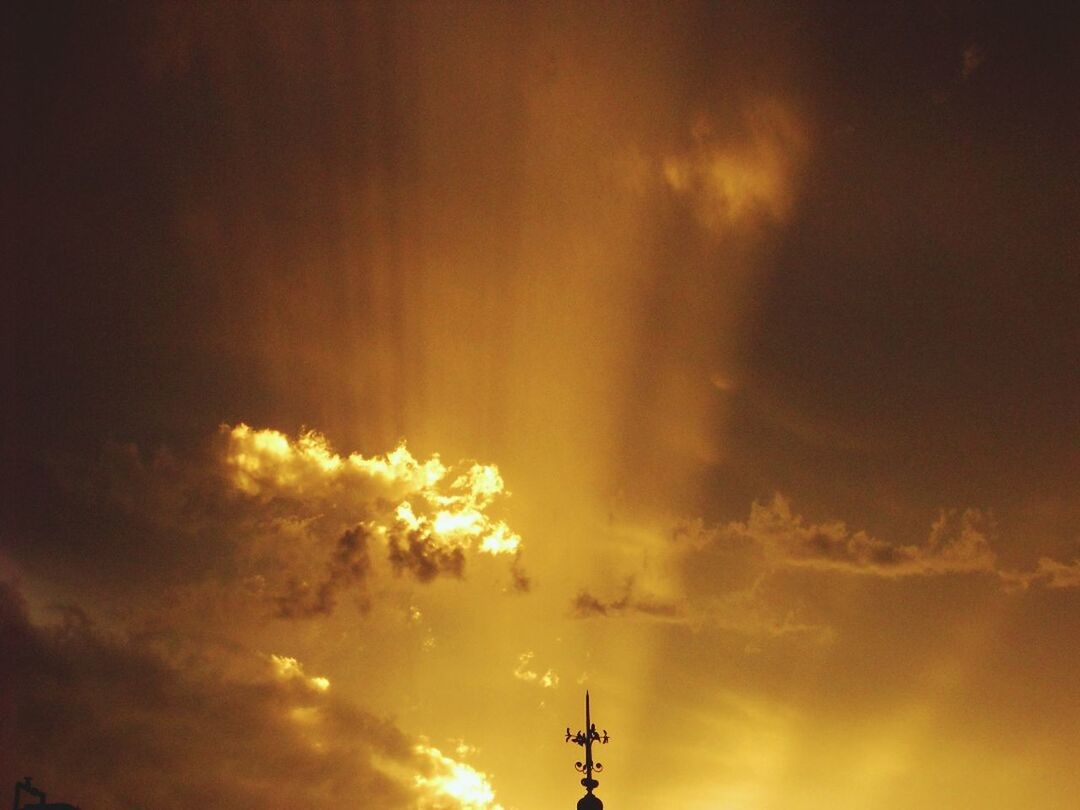 sunset, silhouette, sky, low angle view, orange color, beauty in nature, cloud - sky, scenics, tranquility, dramatic sky, nature, sun, tranquil scene, idyllic, cloud, cloudy, outdoors, back lit, no people, moody sky