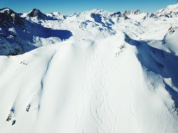 Scenic view of snow covered mountains