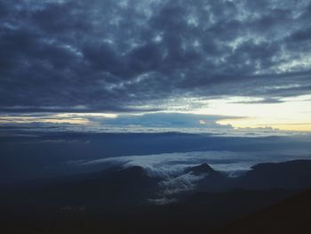 Scenic view of dramatic sky over landscape