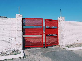 Red building against blue sky