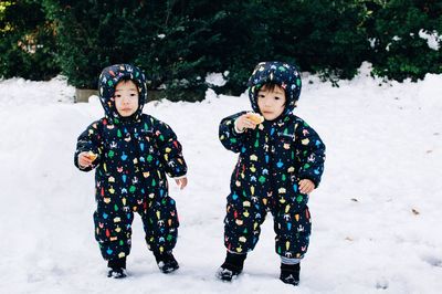 Woman with hands in mouth