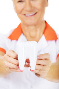 Midsection of woman holding ice cream