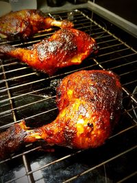 High angle view of meat on barbecue grill