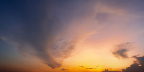 Low angle view of dramatic sky during sunset