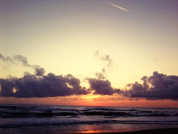 Scenic view of sea at sunset