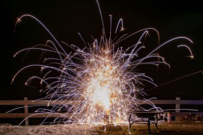 Firework display at night