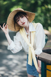 Young woman wearing hat