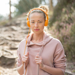 Portrait of beautiful woman standing outdoors