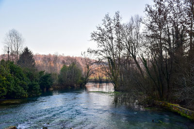 Scenic view of river against clear sky