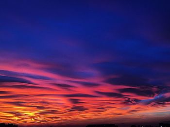 Low angle view of dramatic sky at sunset