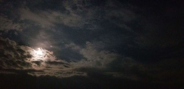 Low angle view of clouds in sky at sunset