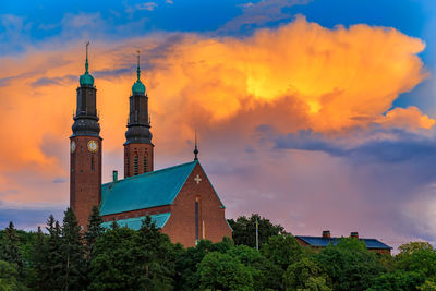 Low angle view of church against sky during sunset